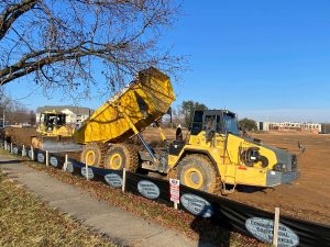 A dump truck and bulldozer