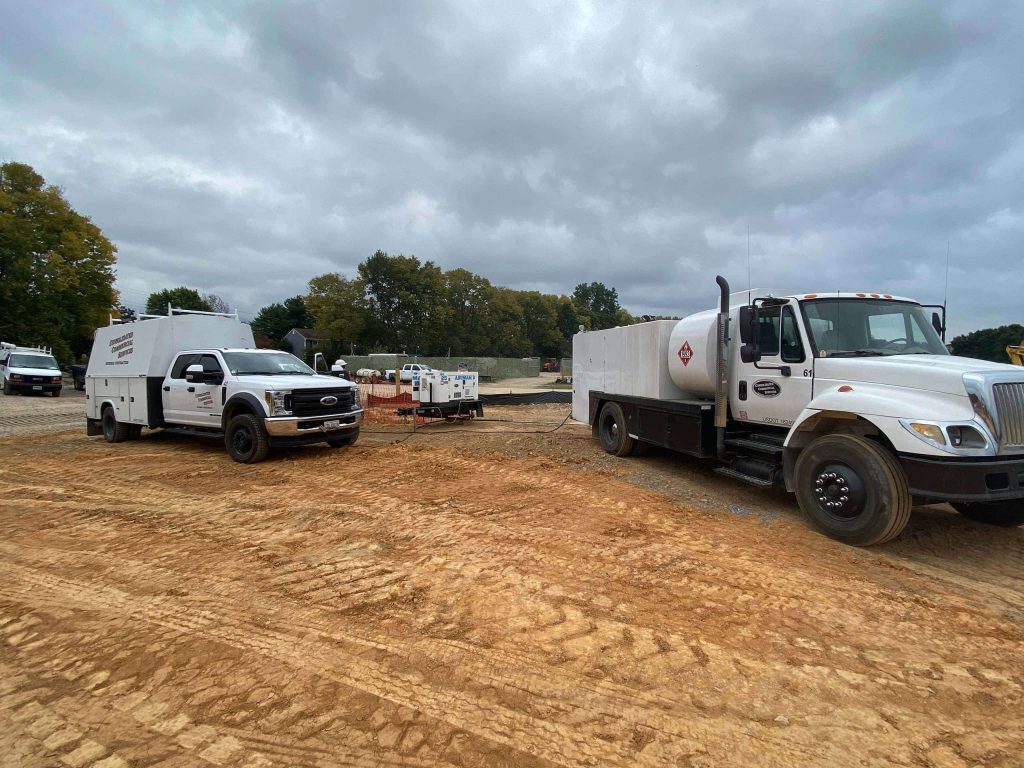 Trucks and equipment on a job site